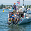 Team Monkey Fist peddles out of Victory Harbour. Photo by Joe Cline.