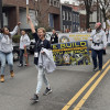 Boilermaker women bring spirit, breaking through the dreary D.C. drizzle at the TWBN banner parade.